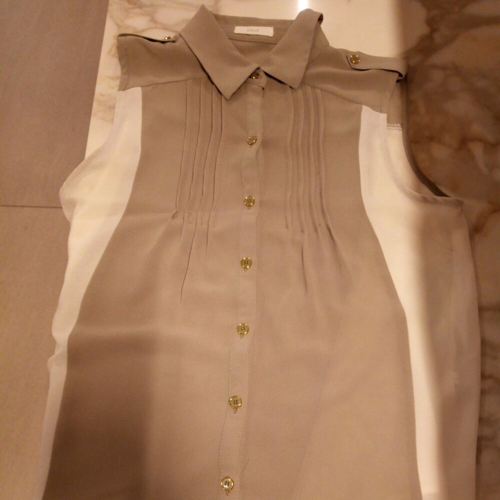 Edge sleeveless blouse